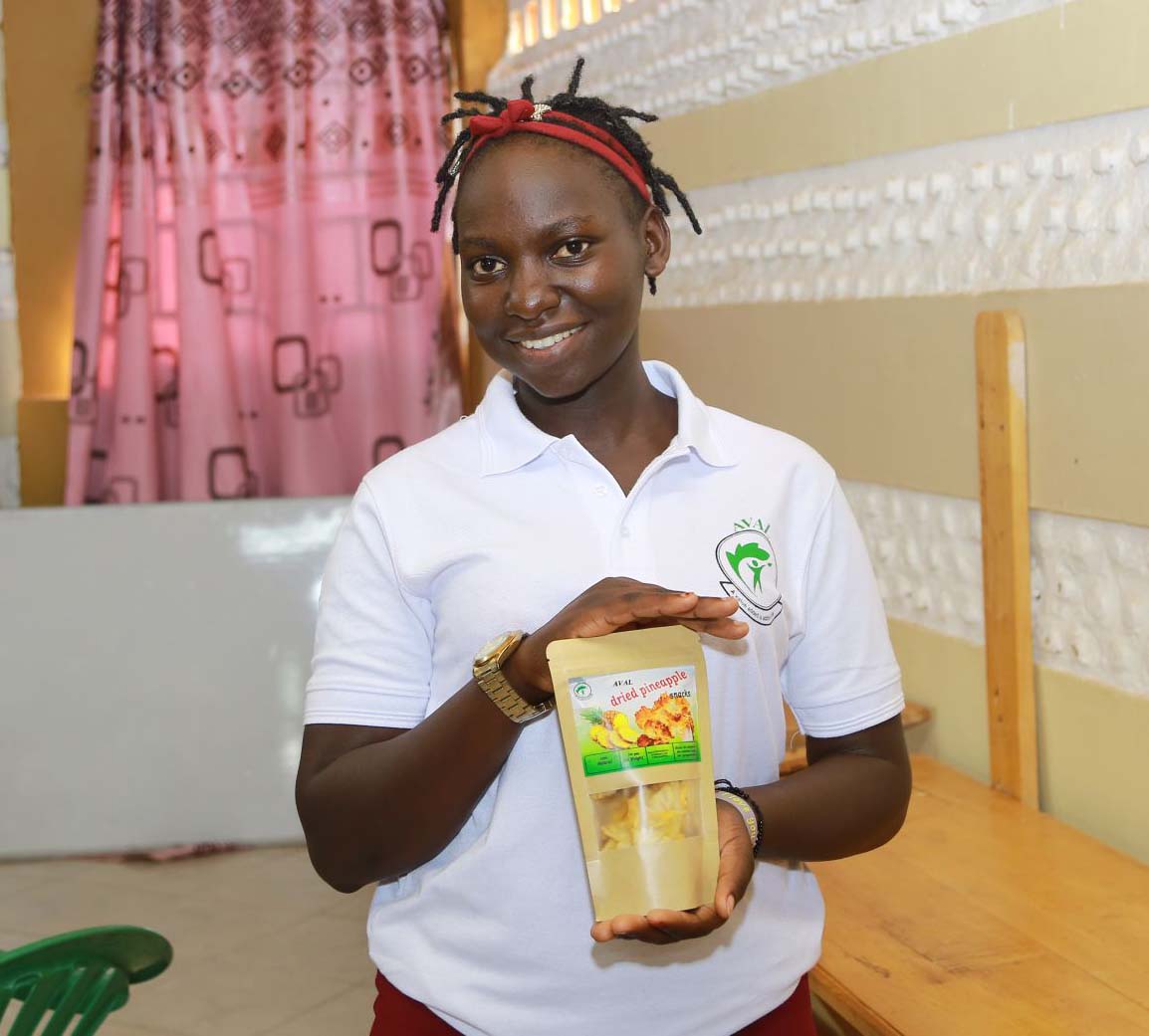 Grace holding Aval product